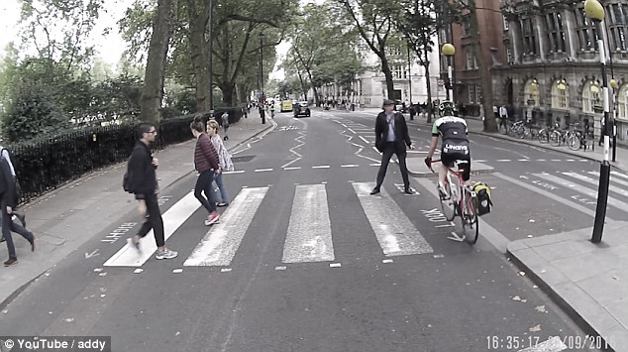 Cyclist running through pedestrian crossing